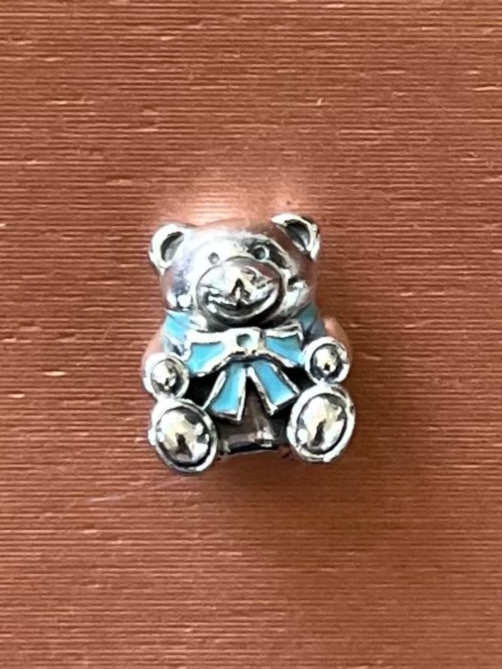 Authentic Pandora Silver Teddy Bear it’s a boy  Charm with Blue Bow. RETIRED